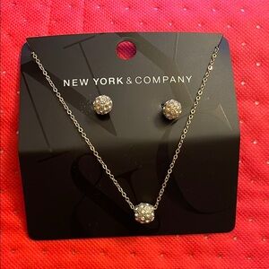 New York & Company gold toned with Crystal Earrings & necklace